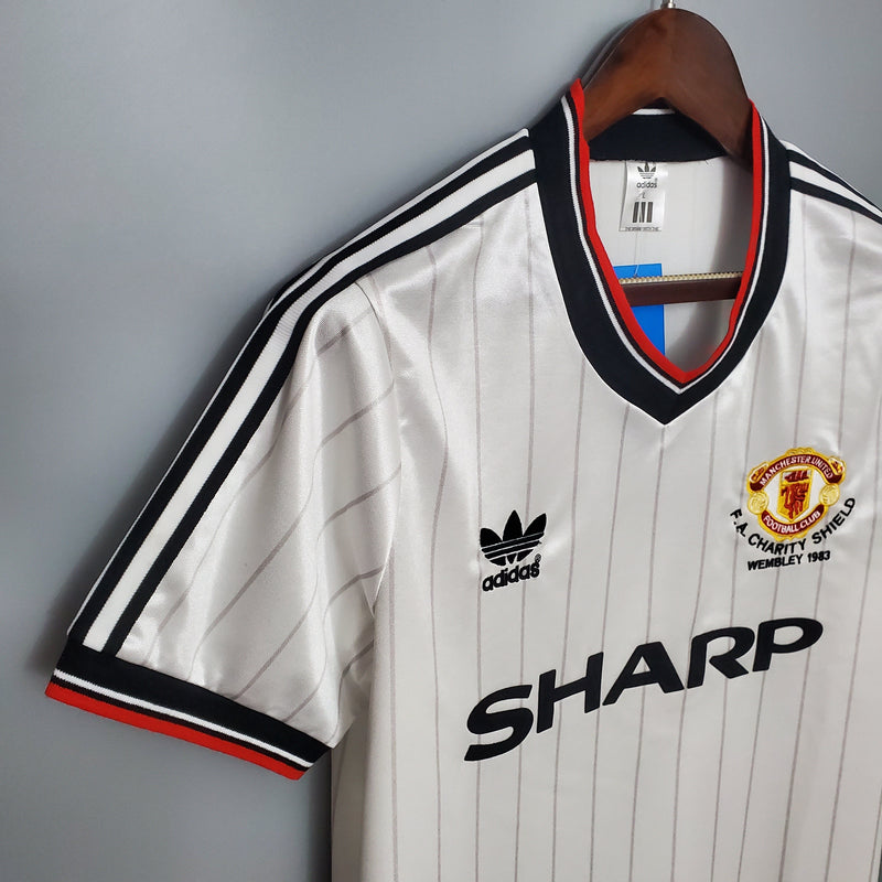 MANCHESTER UNITED II 1983 HOMBRE (RETRO) - TIENDA DEL JUGADOR